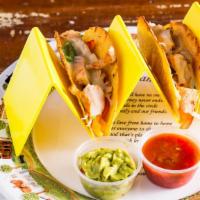 Tacos Choose · For two person. Choose between beef, chicken, bacon, pulled pork or black beans two taco she...