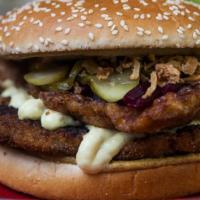 Valhalla'S Pig Farm · Cutlet, mustard, remoulade, roasted onions, pickled beetroot and cucumber.