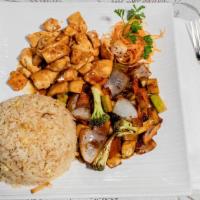 Hibachi Chicken Fried Rice · Served with egg and vegetables.