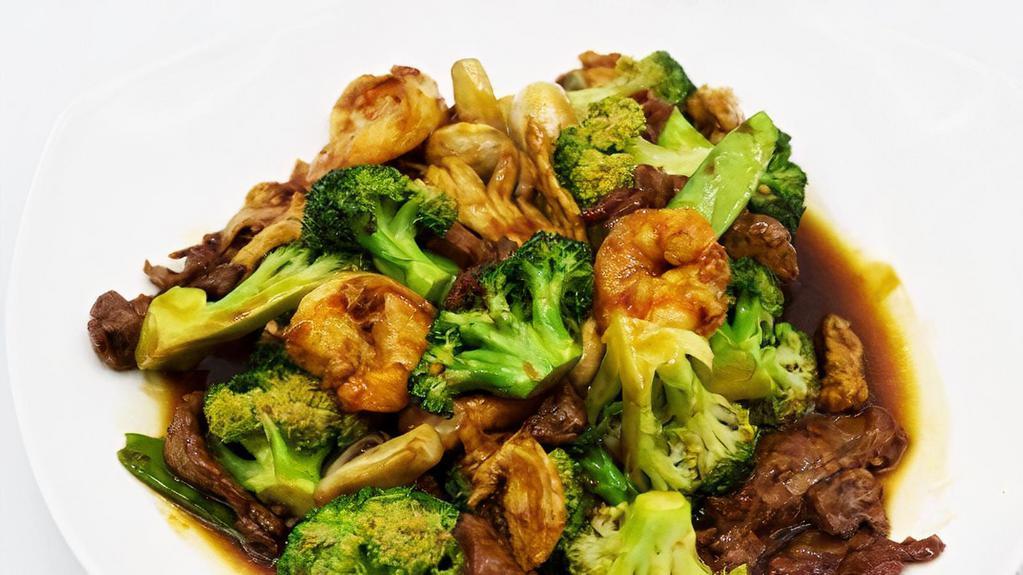 Triple Delight · Shrimp, beef, chicken and vegetables in brown sauce.