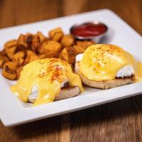Gluten-Free Classic Benedict  · Canadian bacon, poached eggs, hollandaise and paprika on a gluten-free multigrain english mu...