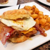 Bc Buttermilk Biscuit · House-made buttermilk biscuit, buttermilk fried chicken, maple bacon, american cheese, and a...