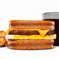 Cheesy Sausage And Egg Toasted Breakfast Sandwich Meal · Our new Cheesy Sausage & Egg Toasted Breakfast Sandwich is served with delicious homestyle f...