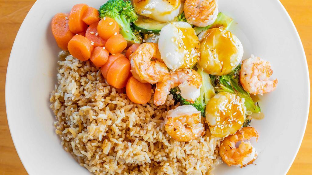 Hibachi Entrée · Served with choice of fried rice or steam rice, onions, mushrooms, zucchini, and broccoli.