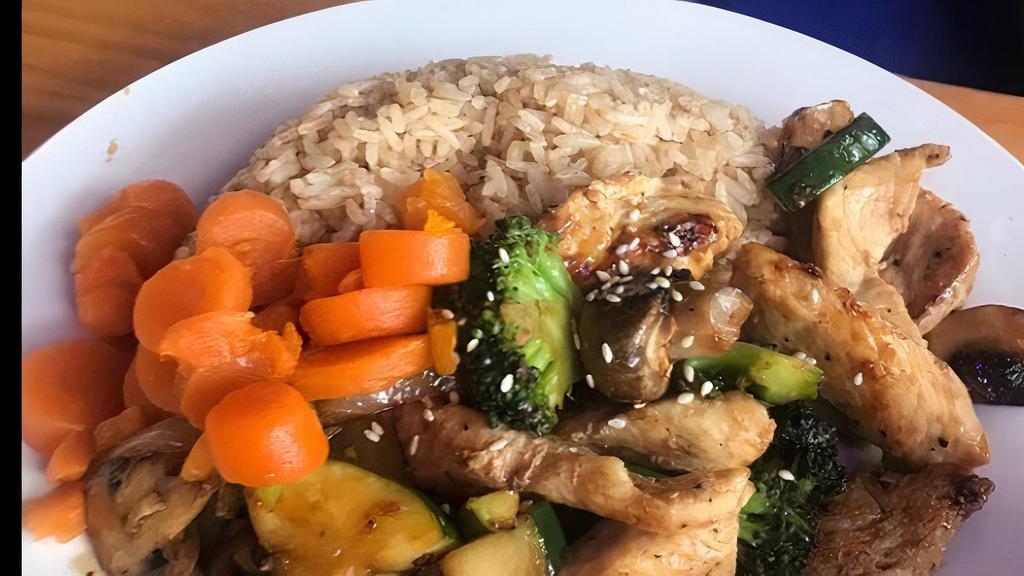 Teriyaki · Fried rice or steamed rice with onions, mushrooms, zucchini, broccoli, and sweet carrots.