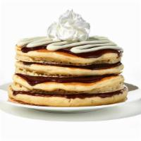 Cinn-A-Stack® Pancakes · Four buttermilk pancakes layered with cinnamon roll filling & topped with cream cheese icing.