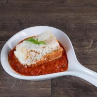 Meat Lasagna · Beef, tomato, mozzarella over layers of tender pasta, topped with marinara sauce and baked w...