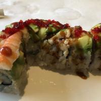 White Dragon · Tempura shrimp, cucumber topped with baked white tuna and slice avocado. Drizzled with eel s...
