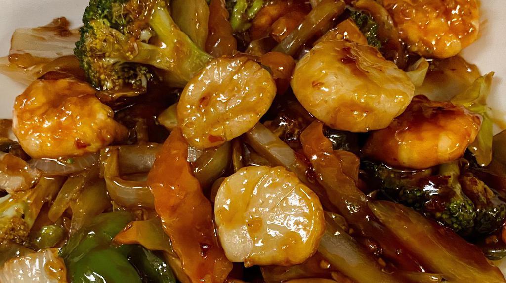 Jumbo Shrimp & Scallops With Garlic Sauce · Jumbo shrimp and fresh scallops stir fried with broccoli, water chestnuts and a variety of Chinese vegetables in delicious and spicy garlic sauce.