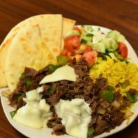 Philly Cheese Steak Platter · Served with Philly cheese steak and rice, your choice of salad, and pita bread.