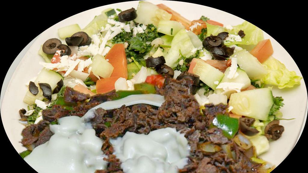 Philly Steak Salad · Comes with your choice of fresh lettuce, tabbouleh, and tomato-onion-cucumber mixture, and feta or shredded cheese.