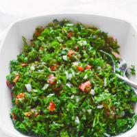Tabbouleh · Fresh shopped parsley, tomatoes, onion, with a special seasoning.