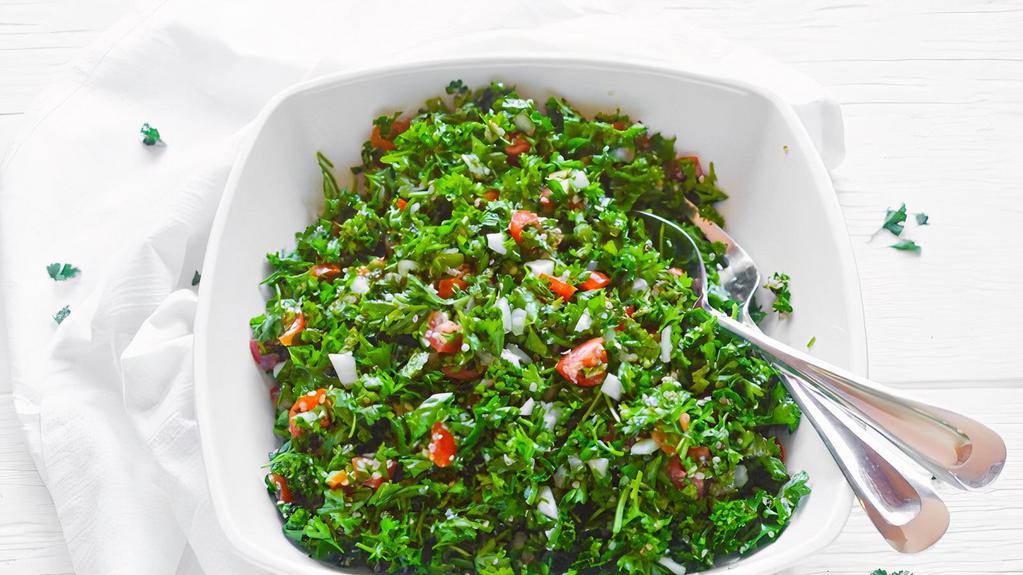 Tabbouleh · Fresh shopped parsley, tomatoes, onion, with a special seasoning.