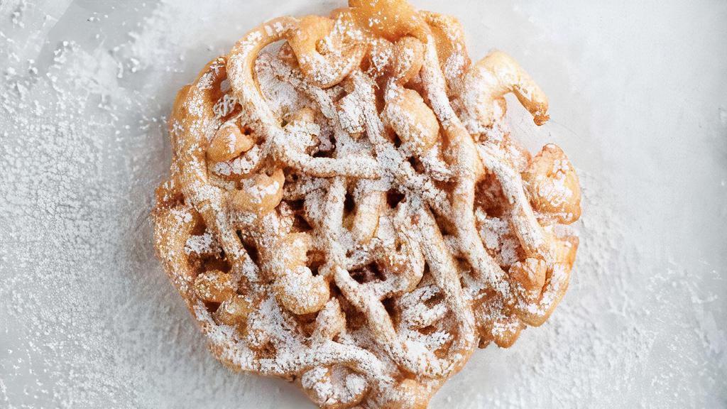 Funnel Cake · Funnel cake with powder sugar on top.