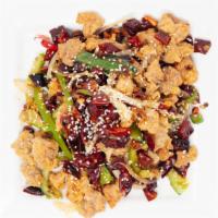 Chongqing Spicy Chicken · Crispy fried chicken stir-fried with chili peppers.