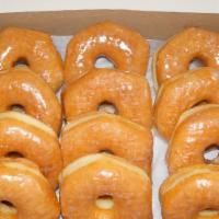 Glaze · A yeast-raised, ring-shaped donut coated in a honey glaze.