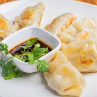 Pot Stickers · Six pieces. Comes with a side of our homemade dumpling sauce.