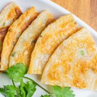 Scallion Pancakes · Vegetarian. Comes with a side of our homemade dumpling sauce.