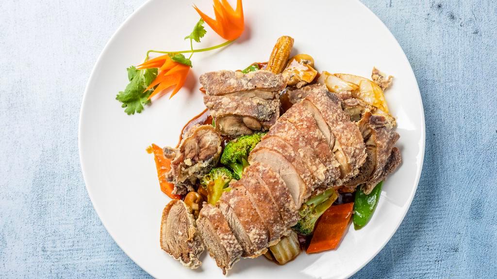 Crispy Duck · Stir-fried mixed vegetables topped with lightly breaded marinated crispy duck.