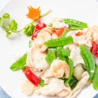 Chicken & Shrimp Supreme · Sliced white meat chicken and jumbo shrimp sautéed in white sauce with snow peas, red pepper...