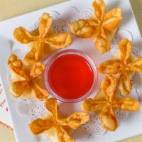 Crab Rangoon · Six pieces. Fried wonton with crabmeat and cream cheese filling.