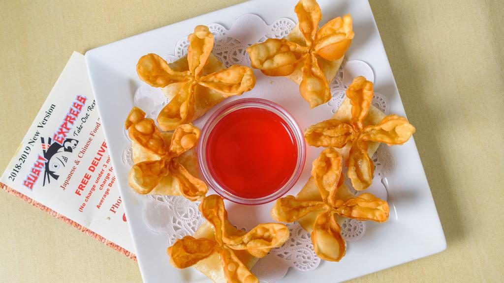 Crab Rangoon · Six pieces. Fried wonton with crabmeat and cream cheese filling.