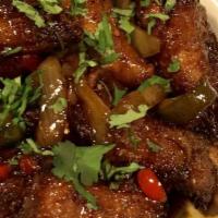 Szechuan Salt & Pepper Jumbo Wings · Fried then glazed in a szechuan salt and pepper glaze along with sautéed onions, peppers & g...