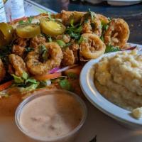 Chilly Willy'S Po Boy · Your choice of seafood (fish, calamari, bay scallops, popcorn shrimp) served with lettuce, t...