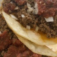 Gringo Taco · Mexican gringo beef with onions, cheese & gringo salsa on a flour tortilla.