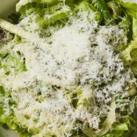 Caesar Salad · Fresh Romaine lettuce topped with crunchy croutons and finished with parmesan cheese.