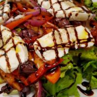Mediterranean Salad · Roma tomatoes, kalamata olives, onions, roasted red peppers, and fresh mozzarella on a bed o...