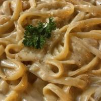 Shrimp Fettuccine · Fresh fettuccine noodles covered with creamy alfredo sauce and large fresh shrimp for a seaf...