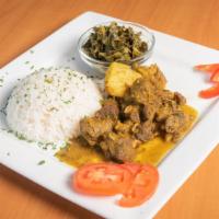 Curry Goat · Served with two sides.
