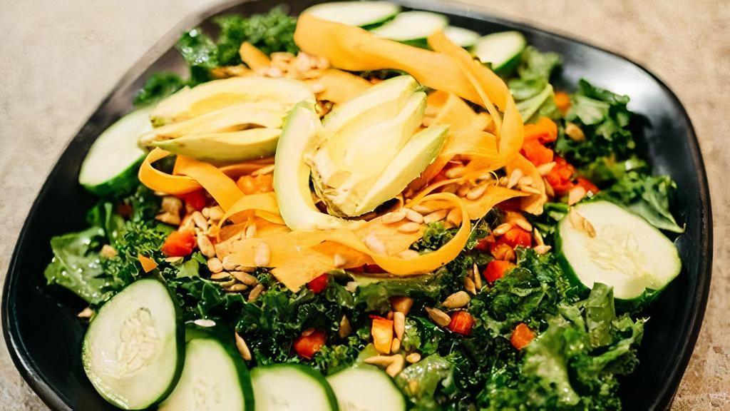 Kale Salad · Kale, cucumbers, red peppers, carrots, dried cranberries, sunflower seeds, tossed in our Italian dressing.