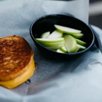Kids Grilled Cheese · Choice of fries or apple slices and choice of soft drink, white or chocolate milk, or apple ...