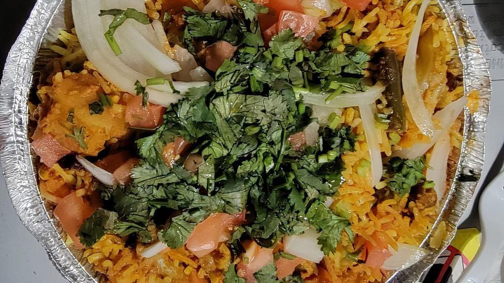 Veg Biryani · Vegan. Veg aromatic basmati rice cooked with mix vegetable and blend of spices.