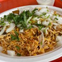 Chicken Biryani · Aromatic basmatic rice cooked with boneless chicken and spices.