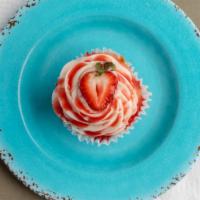 Strawberry Lemonade Cupcake · Lemon cupcakewith strawberry buttercream, drizzle, and strawberry slice.