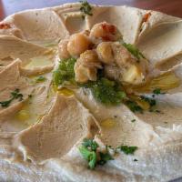 Hummus · Family recipe of blended chick peas, tahini, lemon juice and slate