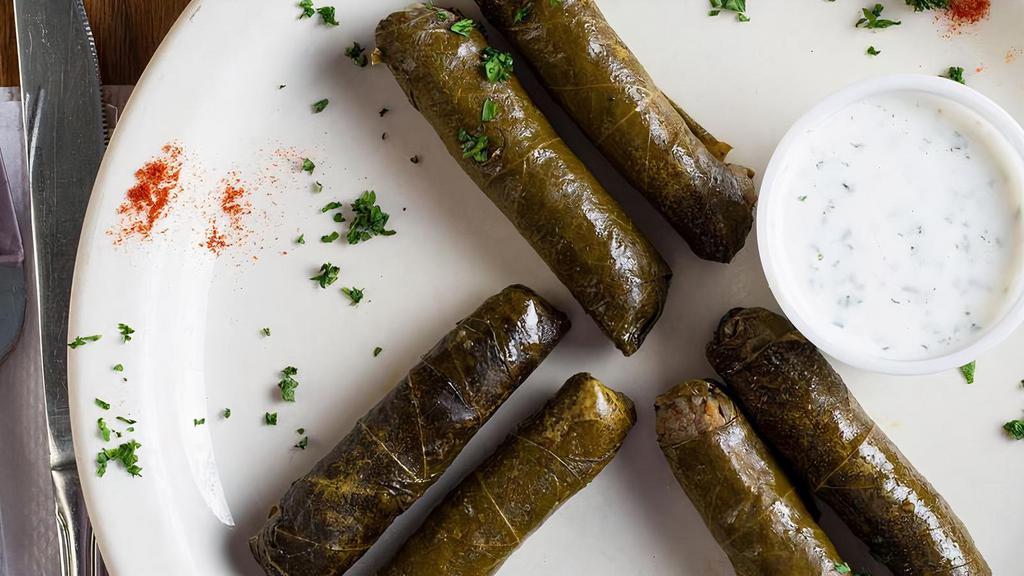 (Meat Appetizer) Stuffed Grape Leaves · Stuffed with rice, ground meat and vegetables.