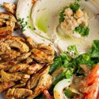 Chicken Shawarma · Sliced rotisserie style chicken marinated with garlic, white vinegar and spices.