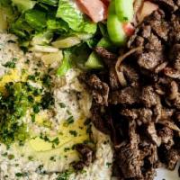 Beef Shawarma · Marinated sliced of beef steak with garlic and spices.
