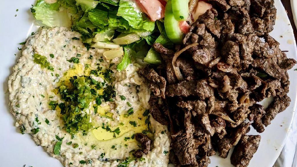 Beef Shawarma · Marinated sliced of beef steak with garlic and spices.