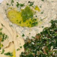 Vegetarian Plate · Tabouleh, hummus, baba ganuj and falafel.