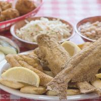 2 Piece Whole Catfish Dinner · Served with white beans, coleslaw, pickles and onions, french fries and world-famous hush pu...