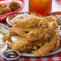 Chicken Picnic Pack - Tenders · Served with white beans, coleslaw, pickles and onions, french fries and world-famous hush pu...