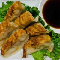 Gyoza · Pot Sticker. 6 pieces. Dumpling with scallion, pork or chicken filling. Steamed and pan frie...