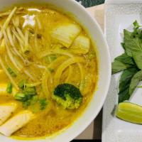 Chicken Curry Pho · Curry broth sauce served with chicken or tofu. Garnished with fresh vegetables and herbs.