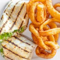 Chicken Caesar Wrap · Grilled or fried chicken with romaine parmesan and caesar dressing. served with fries.