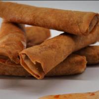Lumpia · Rose's local pork lumpia, served with sweet chili sauce.
